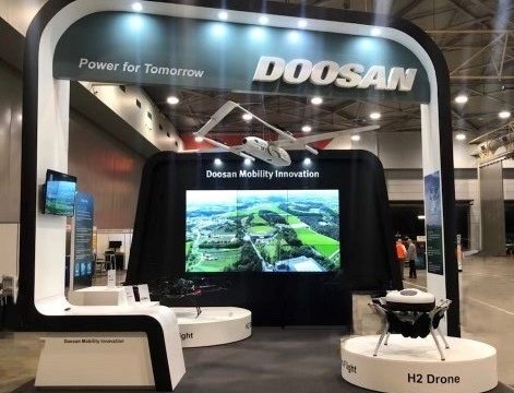 Doosan Stand Front View 471x360 - Exhibition Stand Build - Doosan Mobility Innovation